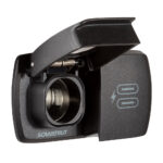 Black open electrical outlet with spring mechanism
