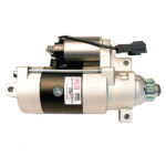 Silver automotive starter motor isolated on white background.