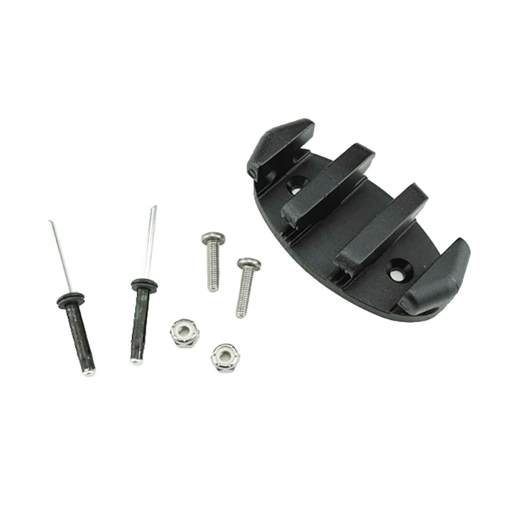 Bike cleat adapter with screws and nuts.