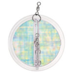 Round bird deterrent hanging on swivel.