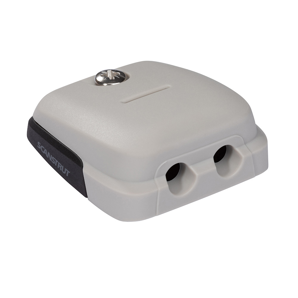 Waterproof cable seal block with dual ports.