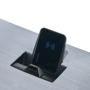 Black wireless charger in a desk mount