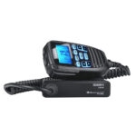 Uniden two-way radio with coiled cord.