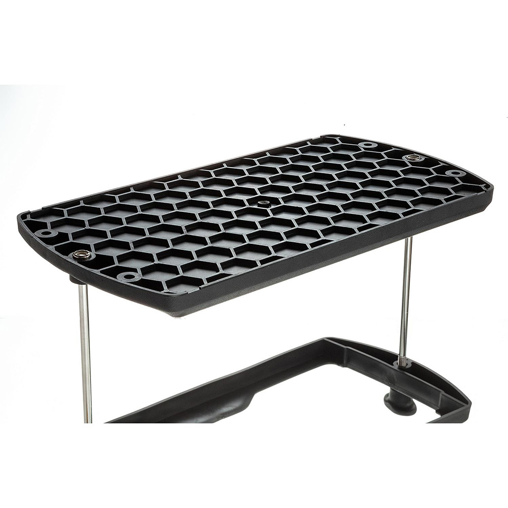 Plastic shelf with honeycomb design and metal supports.
