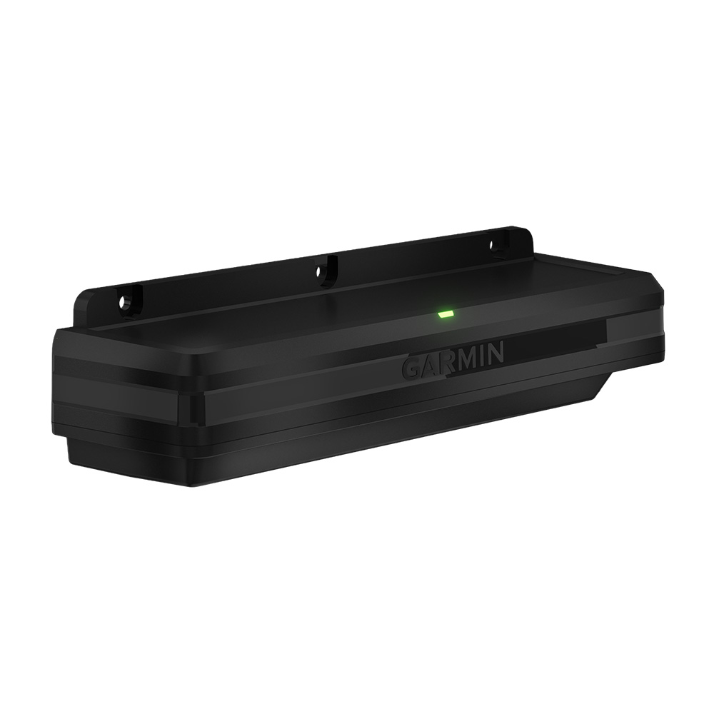 Black electronic device mounted, green LED indicator.