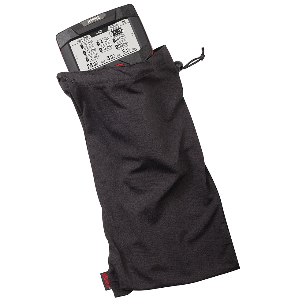Fish scale in black pouch, digital display visible.