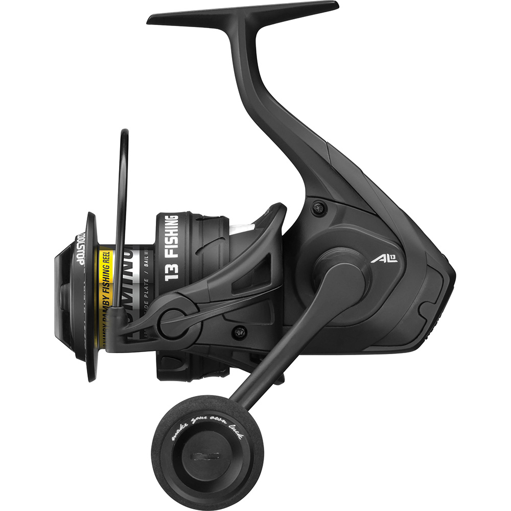 Black fishing reel with ergonomic design.