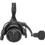 Black fishing reel with ergonomic handle and gear ratio.