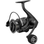 Black spinning fishing reel, side view.