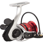 Red and black fishing reel closeup