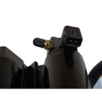 Close-up of black electrical connector and valve