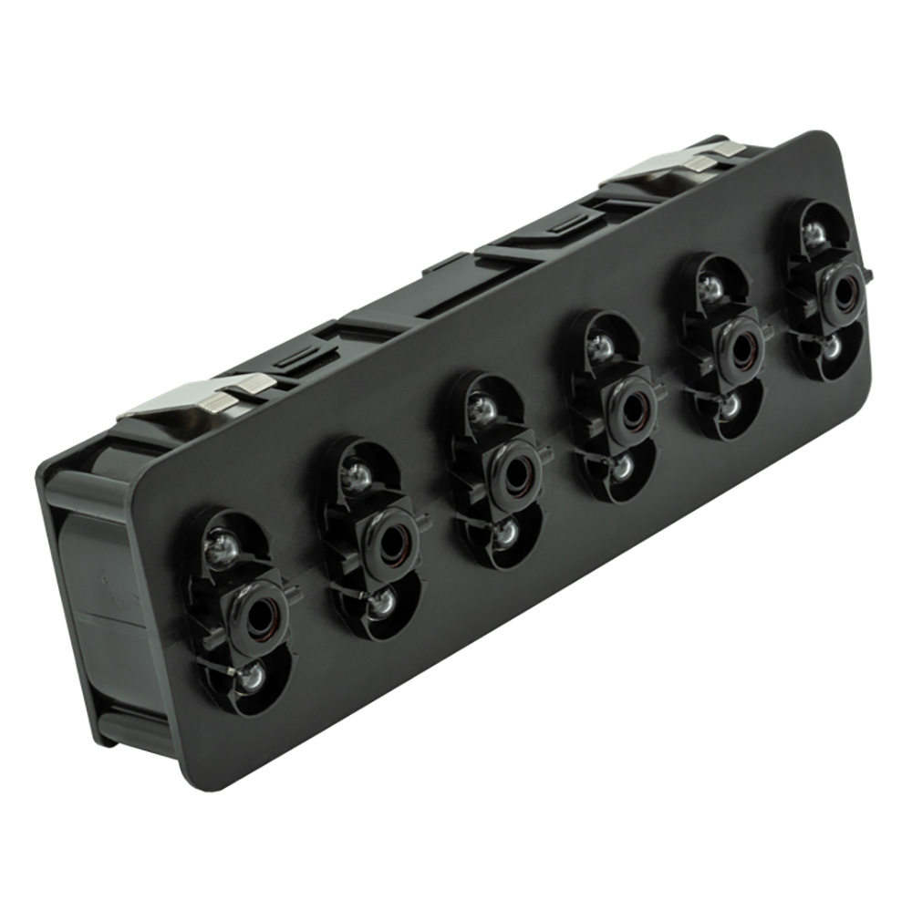 Black plastic automotive connector with multiple slots