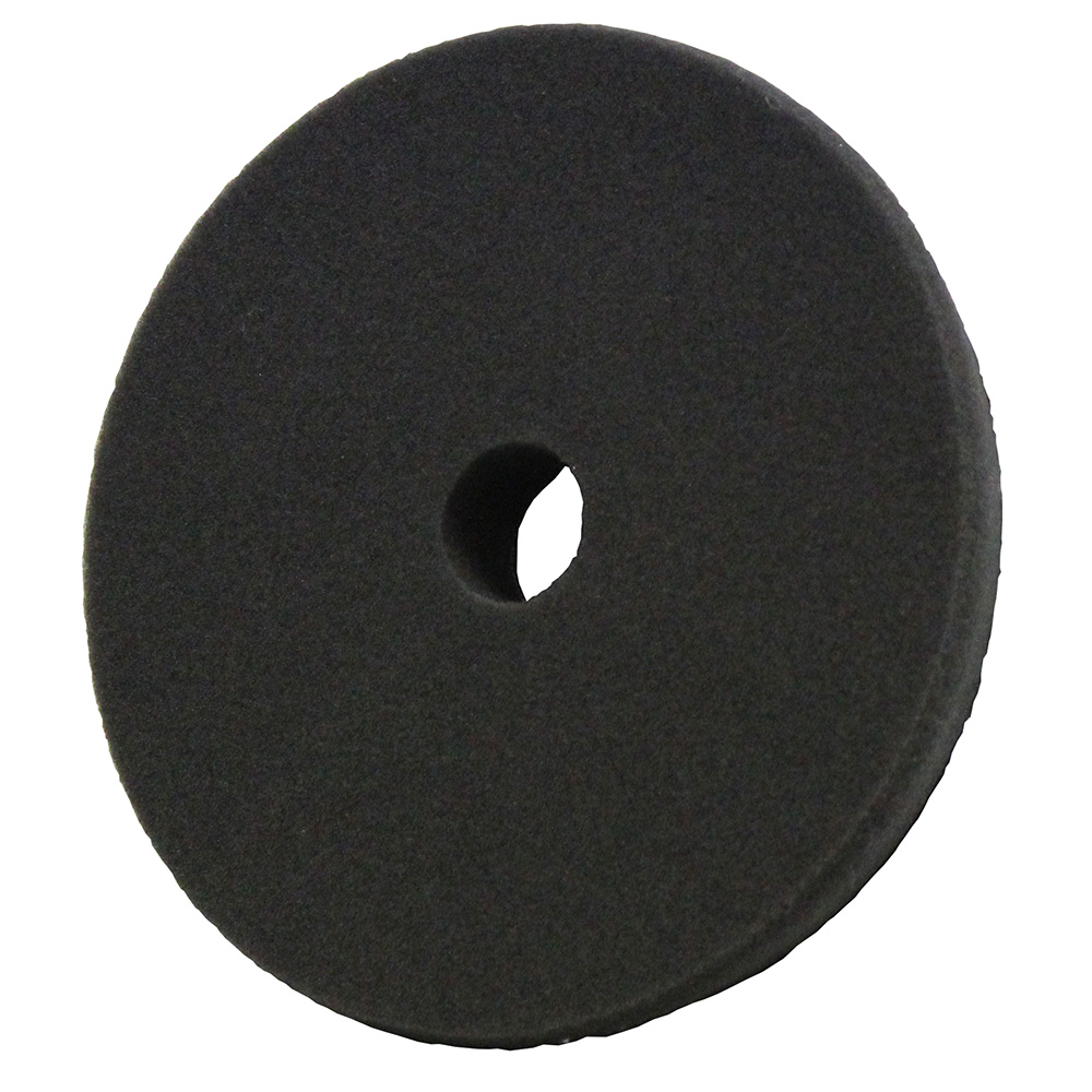 Round black foam pad with central hole.