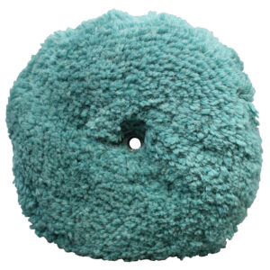 Teal wool polishing pad with central hole.