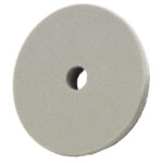 Gray felt polishing wheel with center hole.