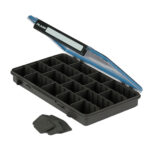 Open tackle box with multiple compartments and dividers.