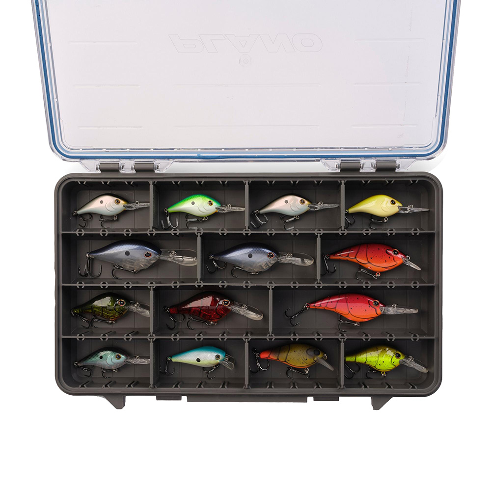Fishing lures in organized tackle box compartments.