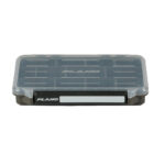 Plano storage box with transparent lid for organizing.