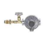 Gas regulator with pressure gauge.