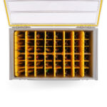 Open tackle box with organized fishing lures.