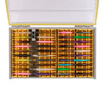 Colorful handmade lures organized in a tackle box.