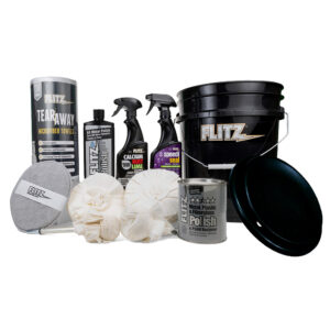 Flitz cleaning products kit with polishes and towels.