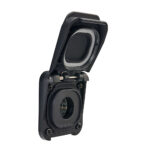 Closed black electrical outlet with protective cover.
