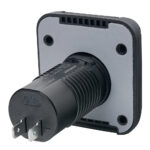 Close-up of a black electrical connector plug.