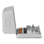 Open industrial control unit with visible connectors.