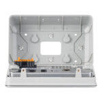 Open electrical enclosure box with connectors and ports.