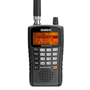 Handheld police scanner with menu options displayed.