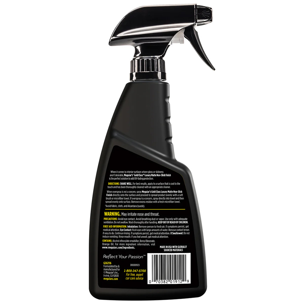 Black spray bottle with silver nozzle and label.