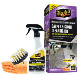 Carpet and cloth cleaning kit with brush and spray.