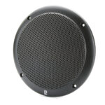 Black round speaker with perforated grille.