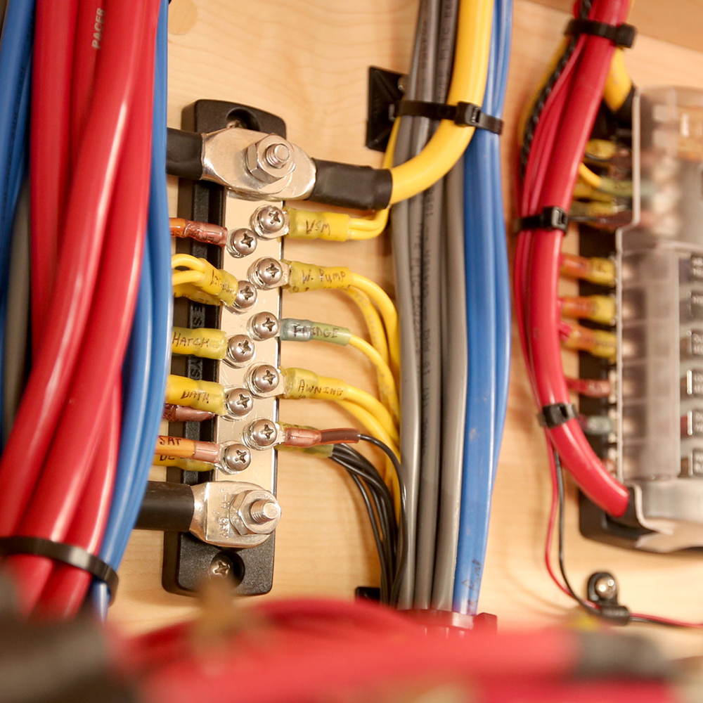 Colorful electrical wiring with labels and connections.
