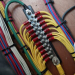 Colorful electrical wiring connections on a panel