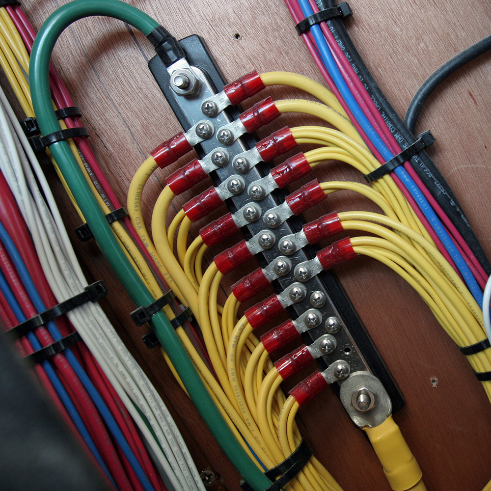 Colorful electrical wiring connections on a panel