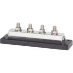 Electrical busbar with four bolt connections.