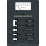 120V AC power distribution panel with breakers.
