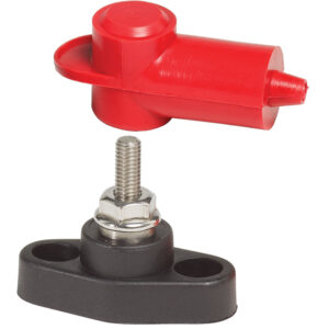 Red electrical connector and nut on black base.