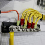 Electrical terminal block with connected wires