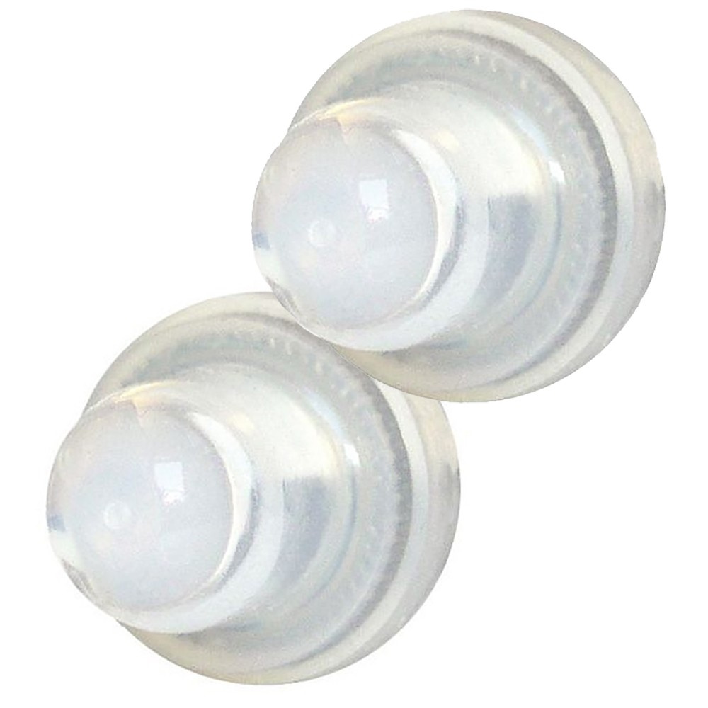 Transparent silicone earplugs, close-up view.