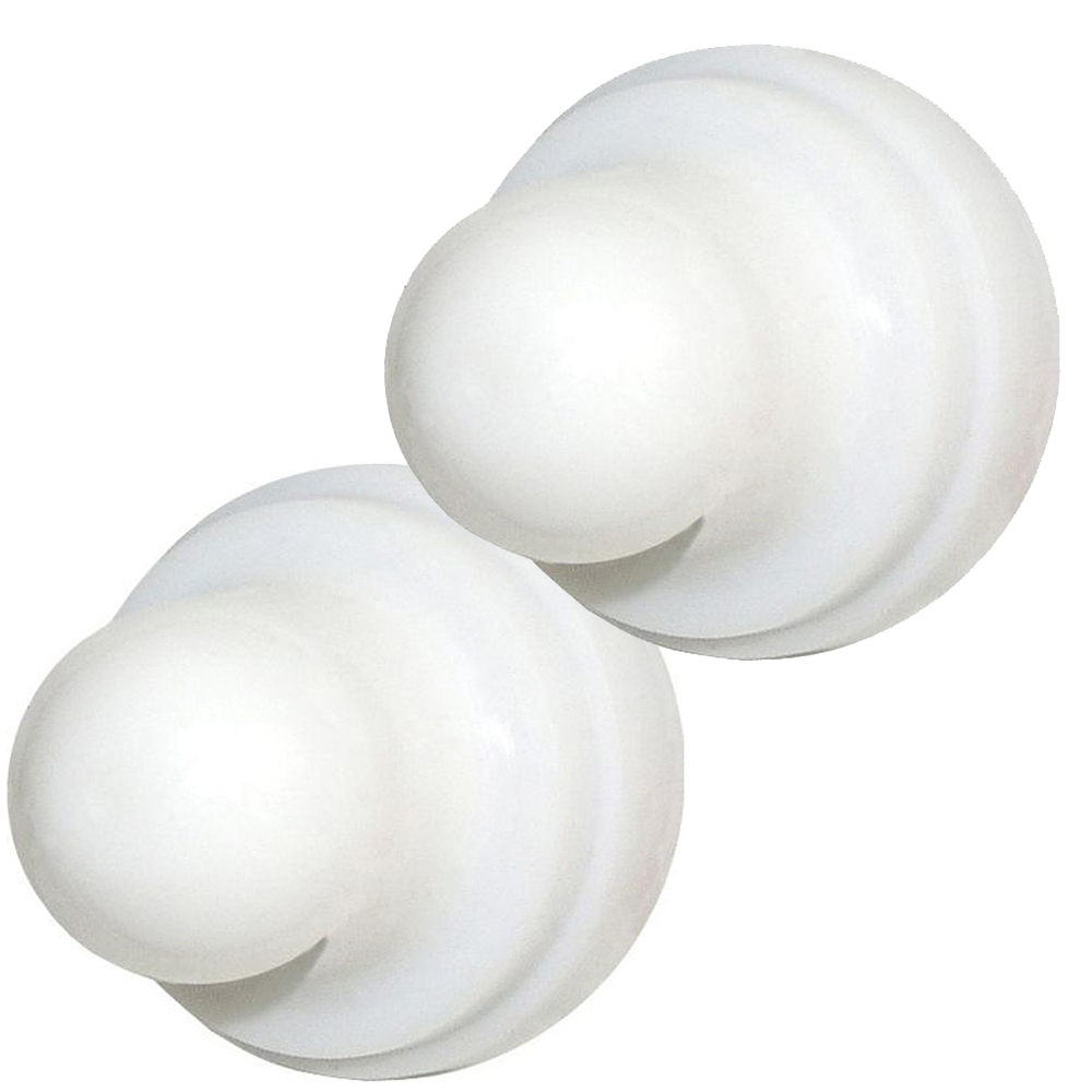White plastic door stoppers, round design, two pieces.