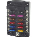 Blade fuse block with various colorful fuses.
