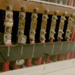 Close-up of electrical panel with labeled switches.