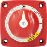 Red rotary switch for battery isolation and combination.