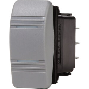 Gray electrical rocker switch, side view.