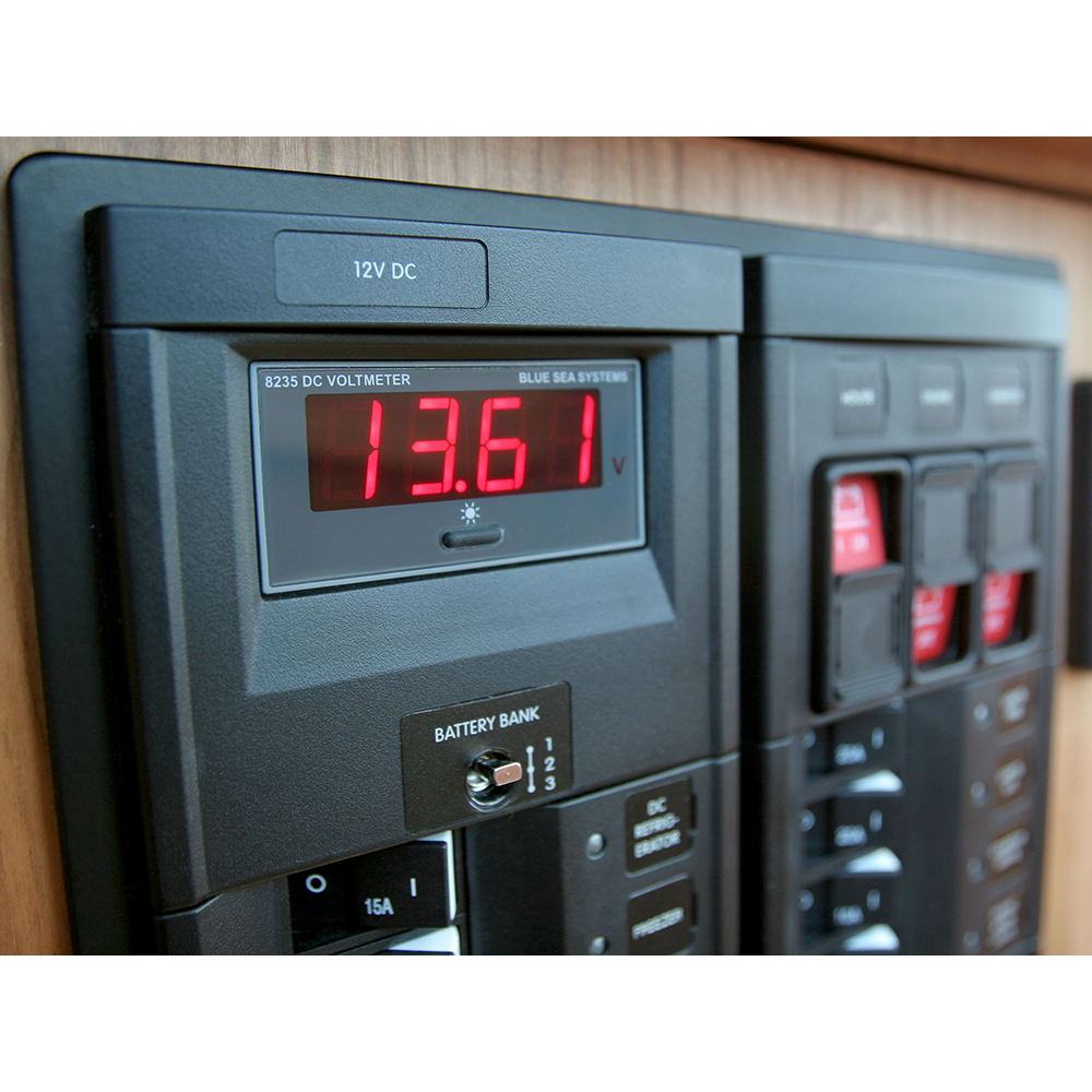 Digital voltmeter reading 13.61 volts on panel.