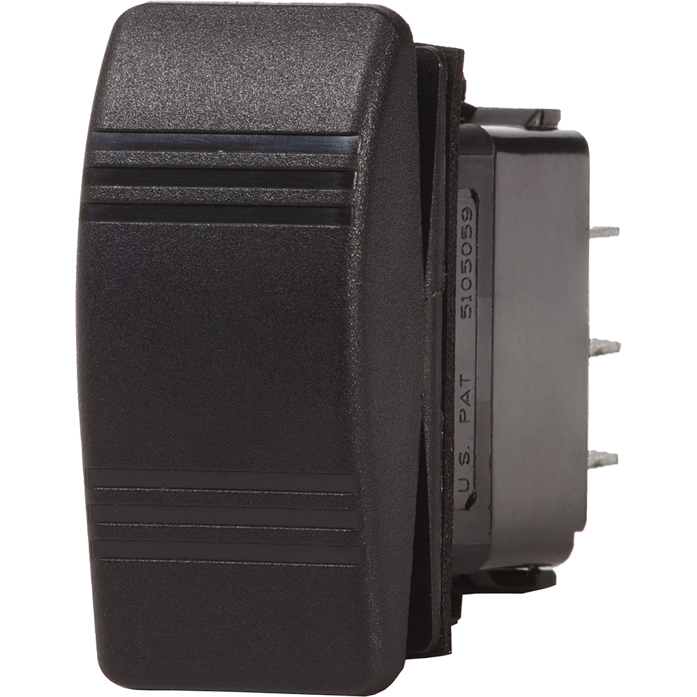 Black rocker switch with patent number visible