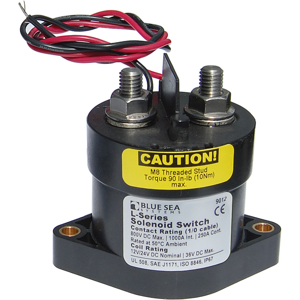 Blue Sea Systems solenoid switch with caution label.